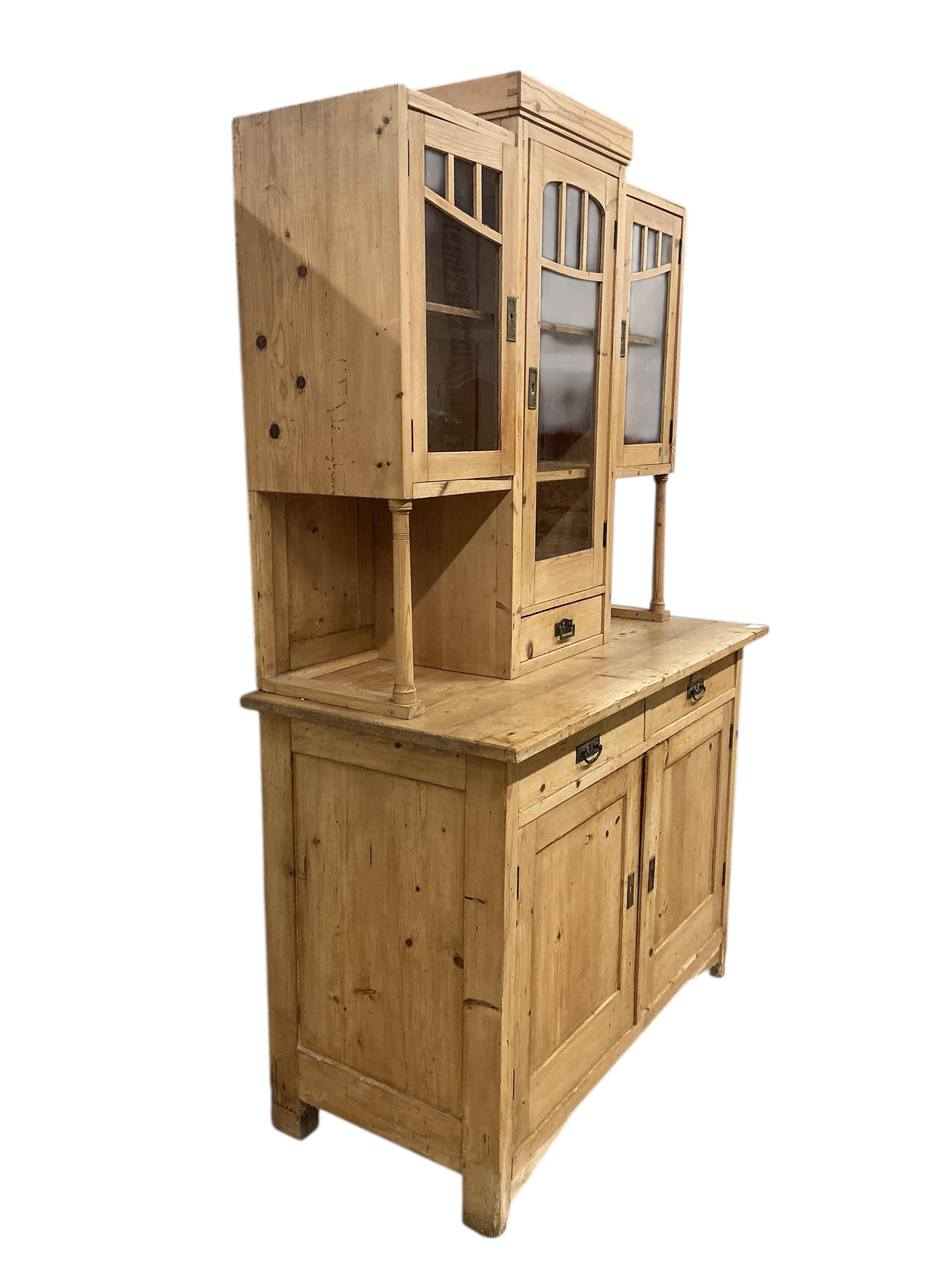 A 19th century East European pine dresser, width 120cm, depth 58cm, height 196cm